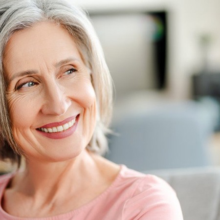 an older woman smiling with a bright smile